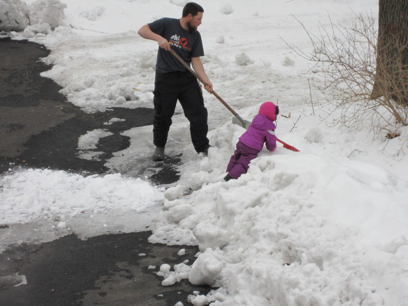 Working hard to help Daddy clear some snow