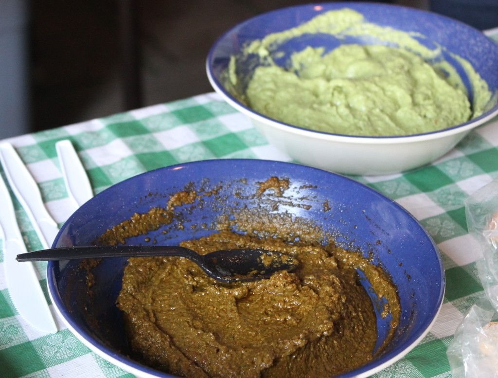 Shown here, the darker pesto includes several pureed sun-dried tomatoes. The brighter green pesto is made without sound-dried tomatoes.