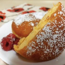 What Are Fasnachts? The Story Behind a Pennsylvania Dutch Delicacy Fasnachts with powdered sugar