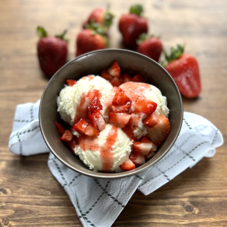 Ice cream with strawberry syrup